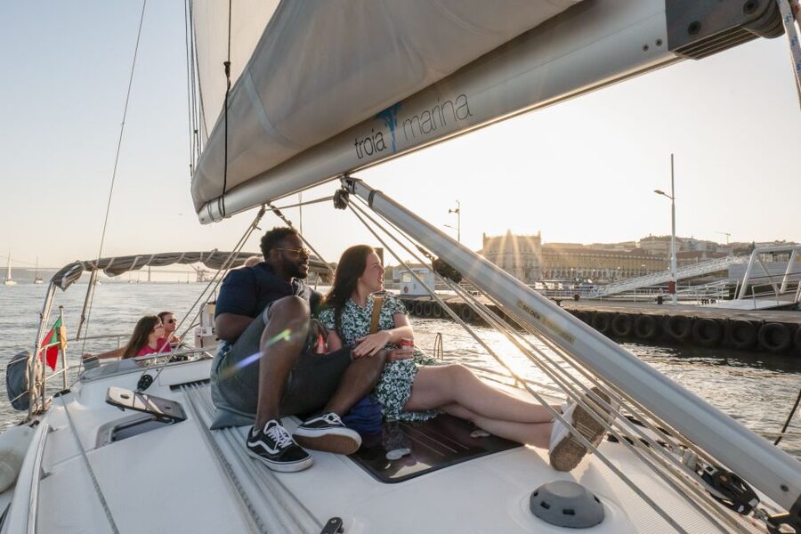 Lisbon: Daytime/Sunset/Night City Sailboat Tour with Drink - Under the 25 de Abril Bridge