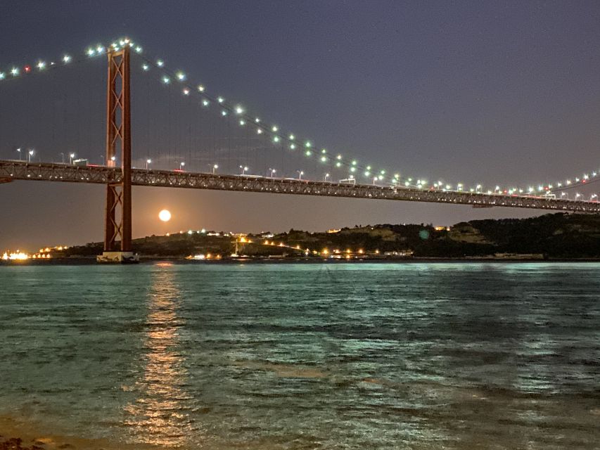 Lisbon: Luxury Sailboat Cruise at Night - Christ the King across the river