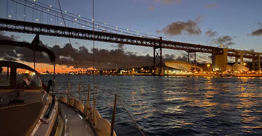 Lisbon: Luxury Sailboat Cruise at Night - Belém Tower and the monuments of the western riverfront