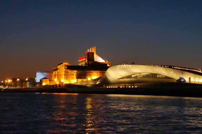 Lisbon Night Sailing Tour with a Drink- 2h Small Group Tour - Cacilhas and Christ the King across the water