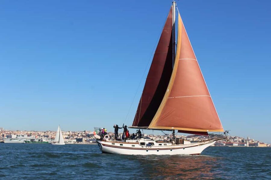 Lisbon: Private Party on a Vintage Sailboat - Looking Across to the Sanctuary of Christ the King