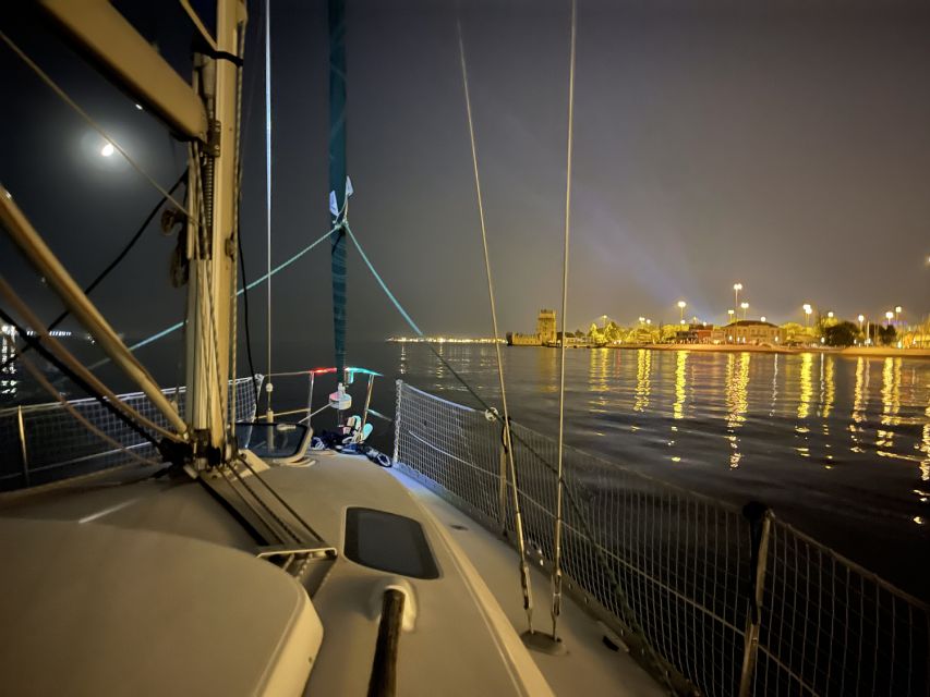 Lisbon: Private sailboat tours on Tagus River - Under the 25 de Abril Bridge