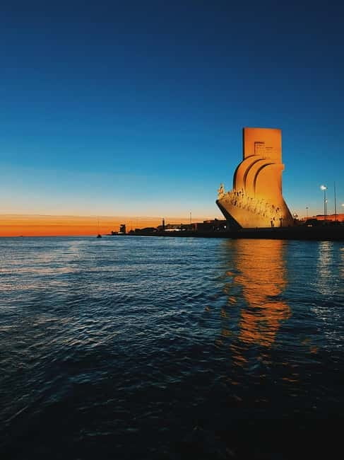 Lisbon: Sailboat Tour along the Coast,Sunset & Tasting - Belém Tower and the Discoveries Monument from the river