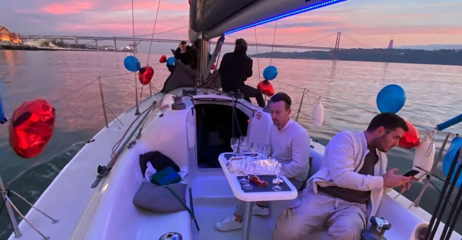 Lisbon: Sailboat Tour w/ Local Guide and Open Bar Green Wine - Meeting the crew beneath the 25th of April Bridge