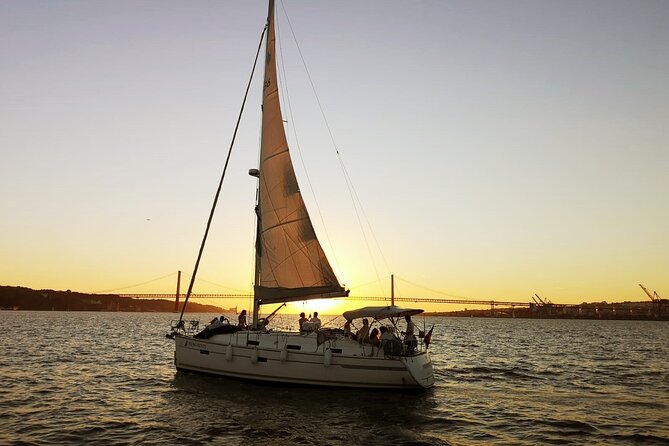 Lisbon Small Group 2h Sunset Sailing- Live Commentary & a Drink - Belém Tower at sunset