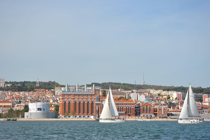 Lisbon Small Group Day Cruise with Historic Commentary & a Drink - Padrão dos Descobrimentos and Portugal’s outward-looking past