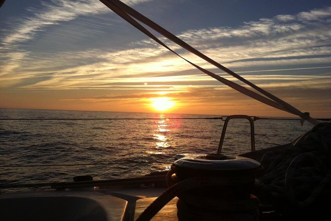Lisbon Small Group Sunset Sailing 2h Cruise with Drinks Included - Drinks, crew, and the mood onboard