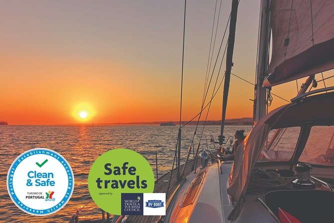 Lisbon Sunset Sailing Tour on Luxury Sailing Yacht with 2 Drinks - Under the 25th of April Bridge