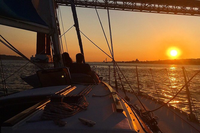 Lisbon Sunset Sailing Tour with White or Rosé Wine and Snacks - The 25 de Abril Bridge and Cristo Rei