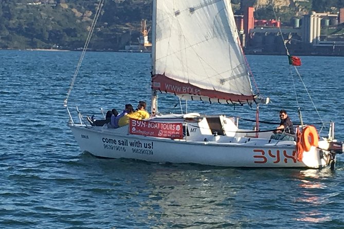 Lisbon Sunset Sailing Tour with White or Rosé Wine and Snacks - Belém Tower and the Discoveries Monument