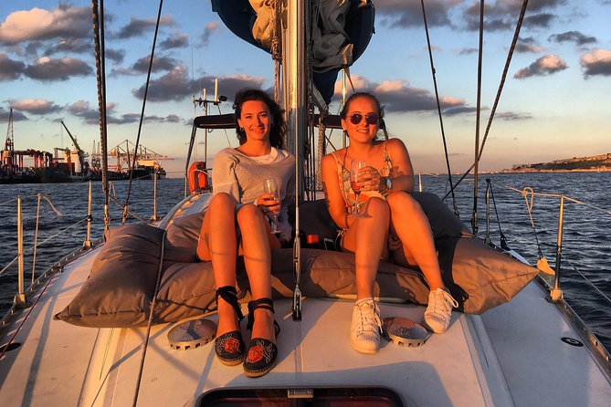 Lisbon Sunset Sailing Tour with White or Rosé Wine and Snacks - Wine, cheese, and what is actually served