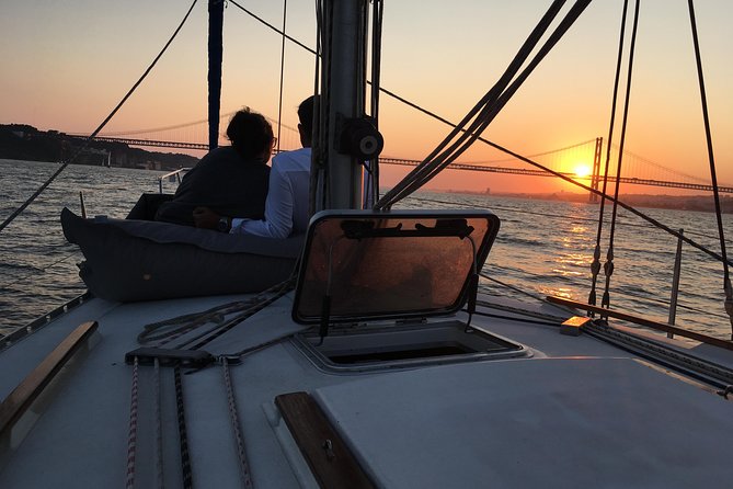 Lisbon Sunset Sailing Tour with White or Rosé Wine and Snacks - The boat, comfort, and river weather