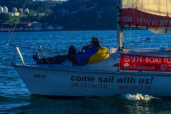 Lisbon Sunset Sensations on a Private Sailing Boat with wine&snacks - Cristo Rei across the river