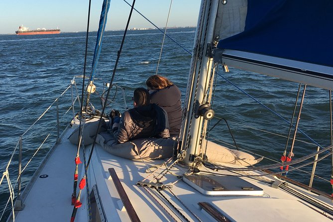 Lisbon Sunset Sensations on a Private Sailing Boat with wine&snacks - The Discoveries Monument and Portugal’s seafaring story