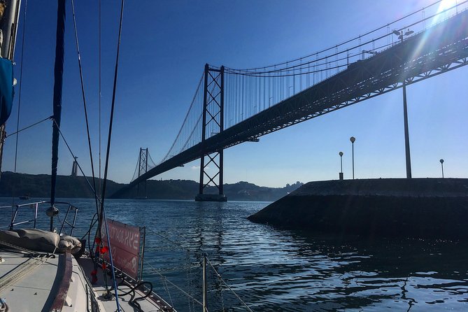 Lisbon Sunset Sensations on a Private Sailing Boat with wine&snacks - The royal palace along the shore