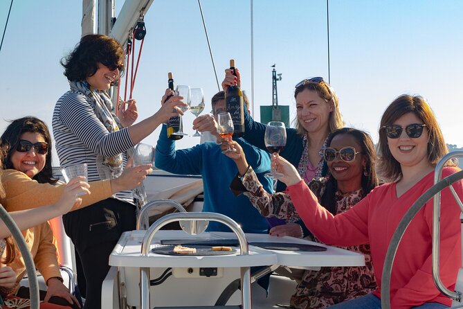 Lisbon: Wine Tasting with Sommelier on a Private Sailboat - Christ the King across the river