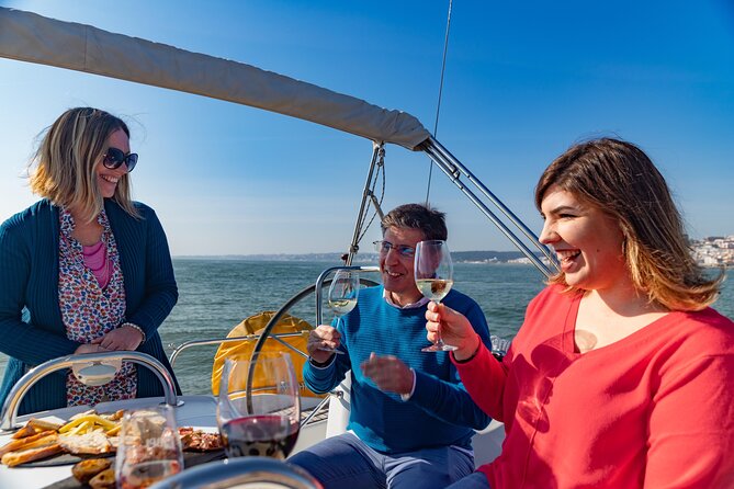 Lisbon: Wine Tasting with Sommelier on a Private Sailboat - Commerce Square and Alfama from the water