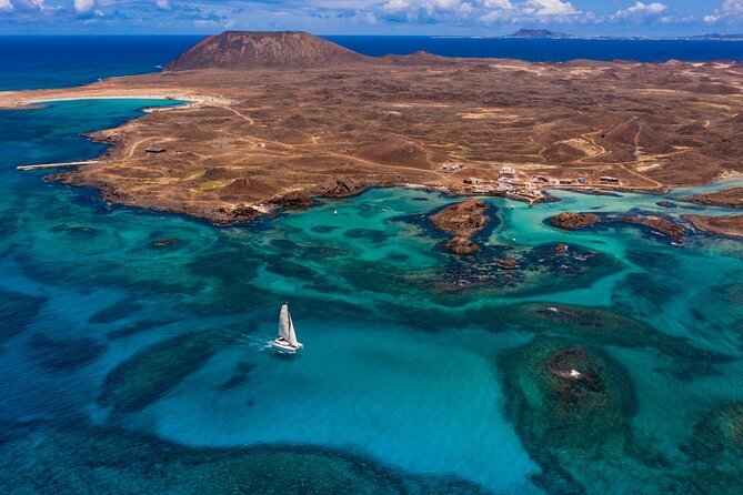 Lobos Island Half-Day Sailing Tour with Lunch - Leaving Corralejo through El Río