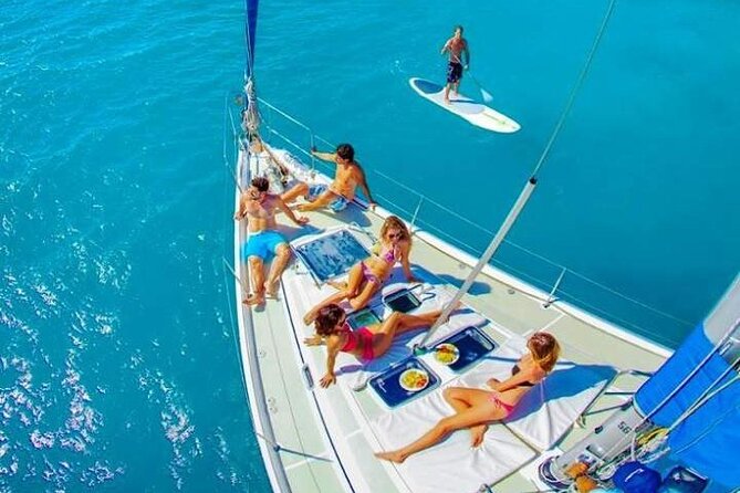 Luxury Sailboat Tour at Sunset in Los Cabos + Snacks + Premium Drinks - Pickup, check-in, and the pier fee