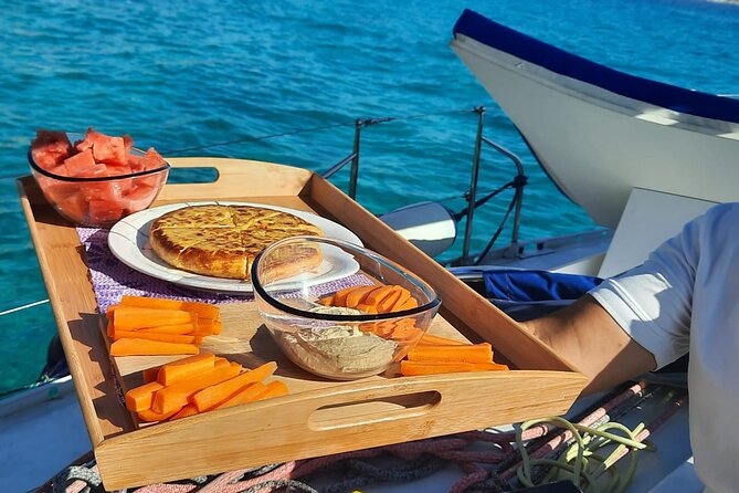 Mallorca Sailing Adventure with Snorkeling, Snacks & Drinks - Tapas, wine, beer, and simple boat food