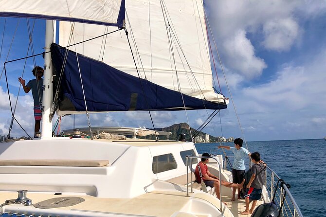 Moana’s Swim’n’Sail Cocktail Cruise Along the Waikiki Coast - Timing, weather, and cancellation details