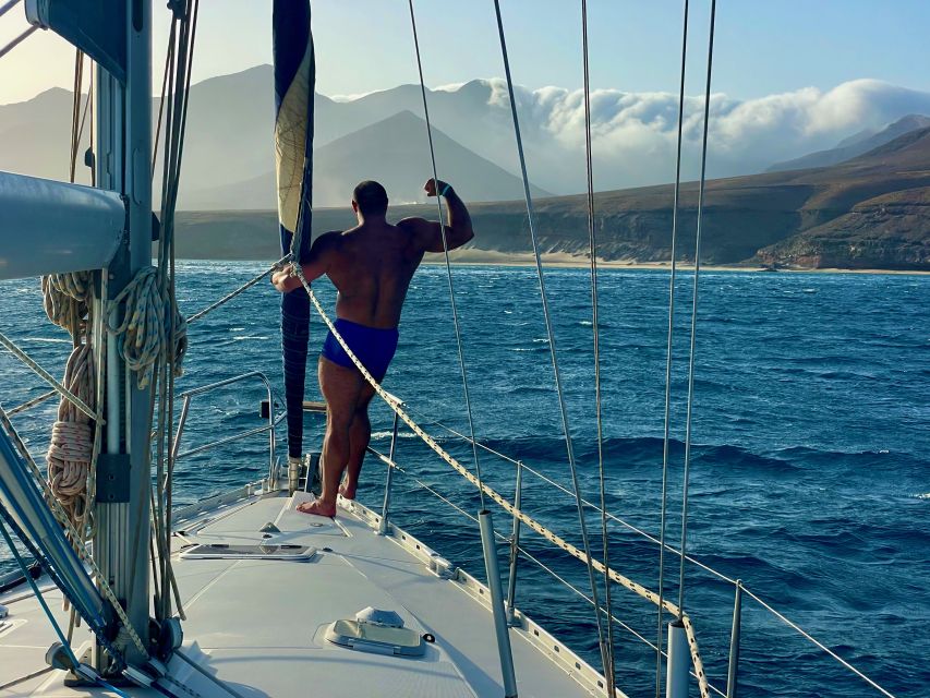 Morro Jable: Sailing Boat Excursion with Food and Drinks - Taking the wheel and meeting the crew
