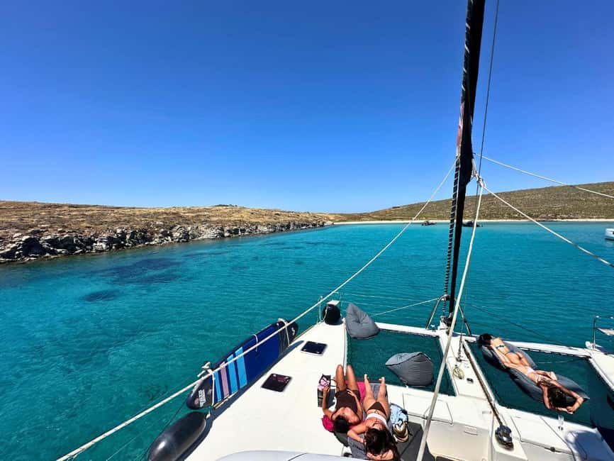 Mykonos Cruise: Prosecco, BBQ, Sailing Demo & Delos Stop - Settling aboard Avra at Platis Gialos