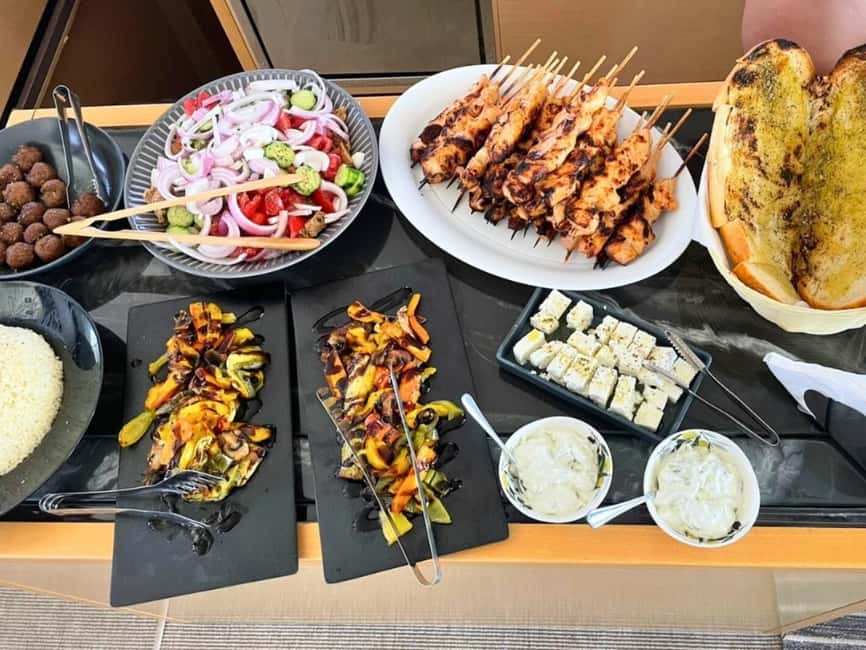 Mykonos Cruise: Prosecco, BBQ, Sailing Demo & Delos Stop - Delos: choose ruins or a quiet swim