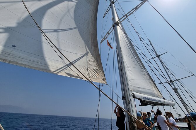 Mykonos Sail Cruise to Rhenia, Guided Tour of Delos, Lunch&Drinks - Walking through ancient Delos