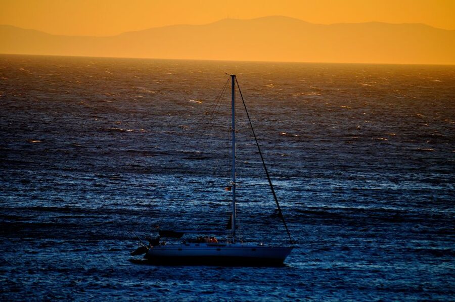 Mykonos: Sunset Sail Cruise to Rhenia, Beach Hopping, Dinner - Greek dinner, wine, and a practical onboard setup