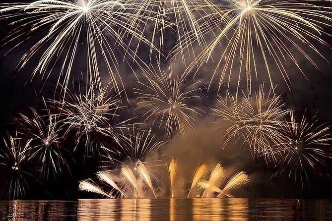 New Year's Eve on a Sailboat with Fireworks display in Lisbon - Praça do Comércio from the river