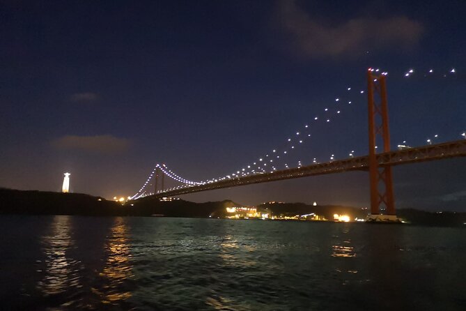 Night Sailing - MOONLIGHT Boat Tour -Exclusive Lisbon City Lights - The 25 de Abril Bridge from the water
