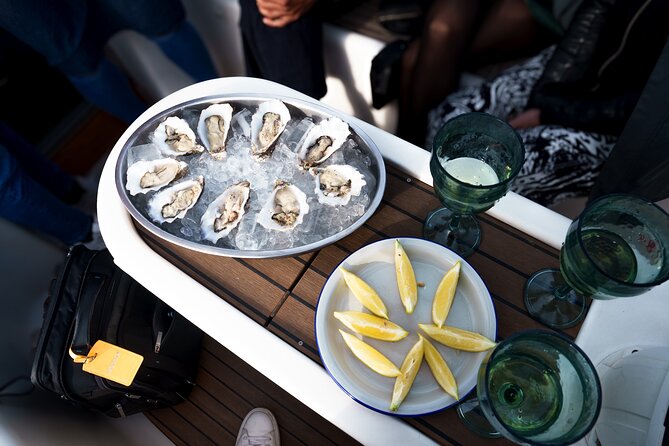 Oyster Odyssey Barcelona's Premier Sailing and Seafood Adventure - Cava, white wine, and the rhythm of the boat