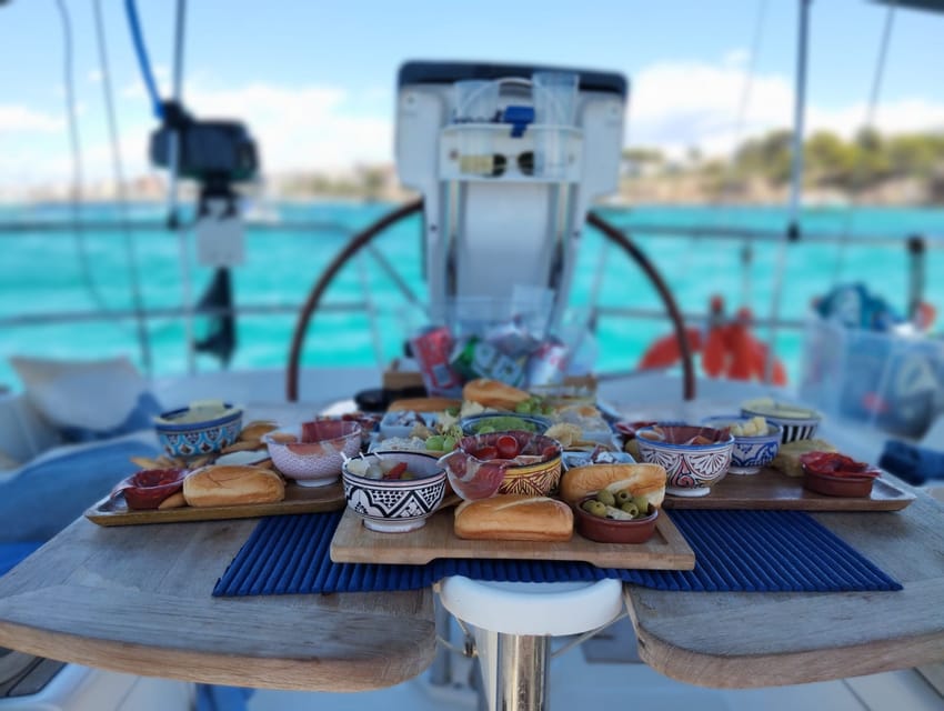 Palma Bay: Sailing Boat Trip W/ Water Toys Snacks & Drinks - Food, drinks, and the rhythm of the afternoon
