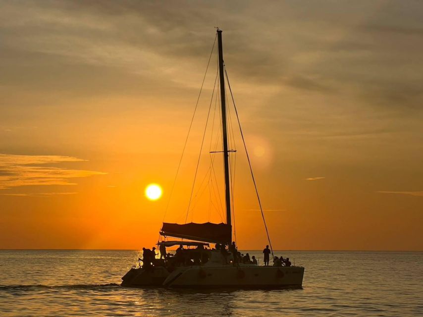 Phuket: Coral Island & Sunset Dinner by Sailing Catamaran - The catamaran ride across Phuket’s coastal water