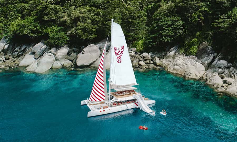 Phuket: Sailing Yacht Island Hopping & Party Full-Day Cruise - The sunset route changes with the season