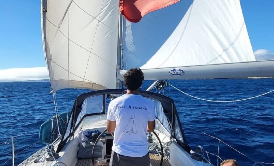 Ponta Delgada Full Day Sailing Tour with Drinks and Snacks - Taking the helm past Ilhéu de Rosto de Cão