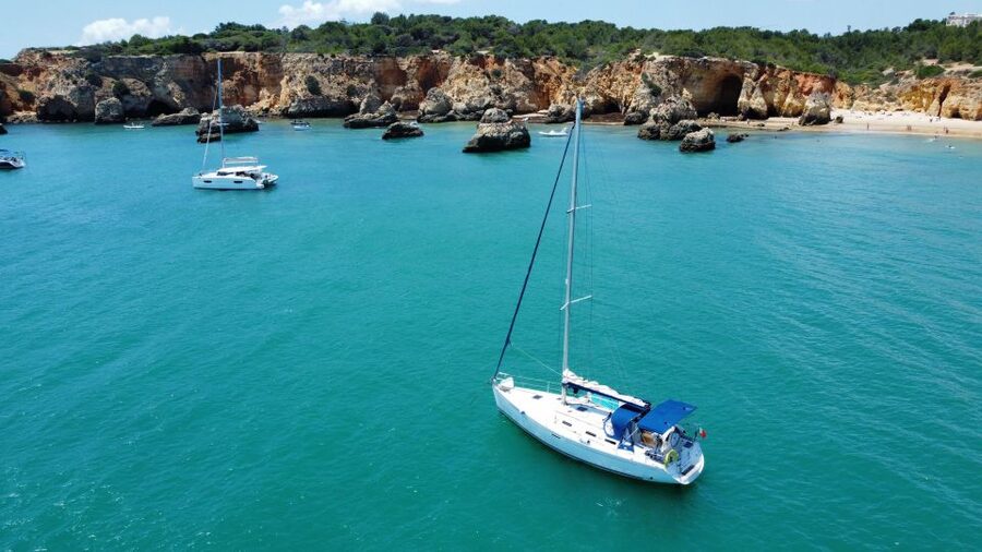 Portimão: Private Sailing Boat Tour with Swim and Wine - Alvor adds a longer pause and a glass of wine