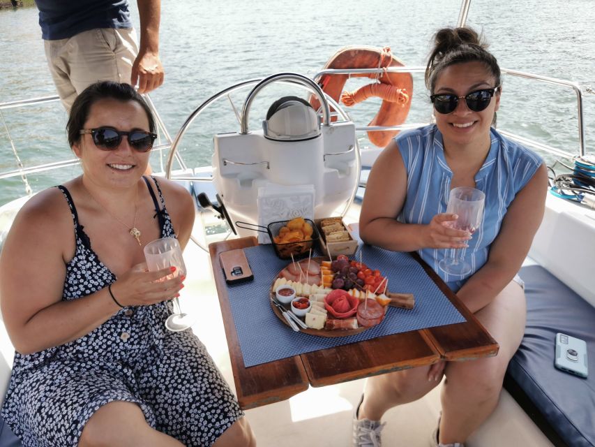 Porto: Private Sailboat Trip with Wine Tasting & Charcuterie - The Dom Luís I Bridge and the tasting board