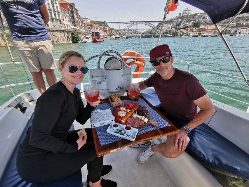 Porto: Private Sailboat Trip with Wine Tasting & Charcuterie - Under the Arrábida Bridge with your first glass