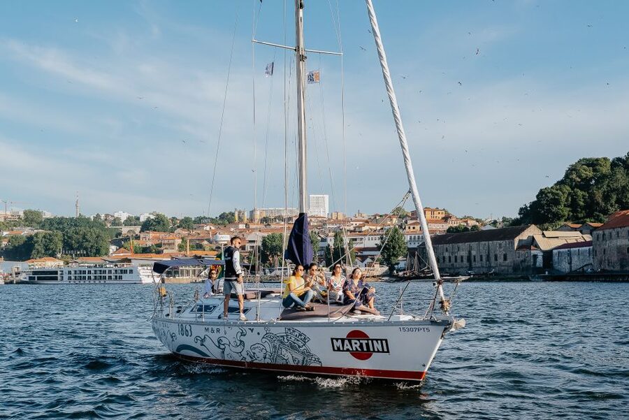 Porto: Romantic Sailboat Cruise - Passing the Arrábida Bridge