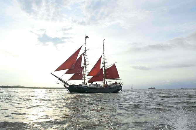 Premium Pirate Beach Adventure, Open sea Rope Swing, Drinks+Lunch - Leaving Cartagena through the harbor