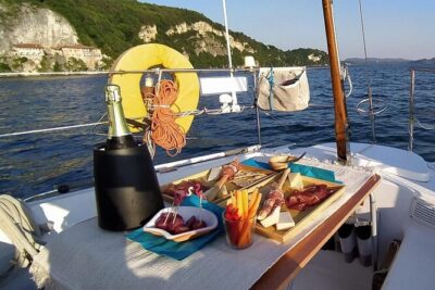 Private Tour on a Sailing Boat on Lake Maggiore with Aperitif and Music