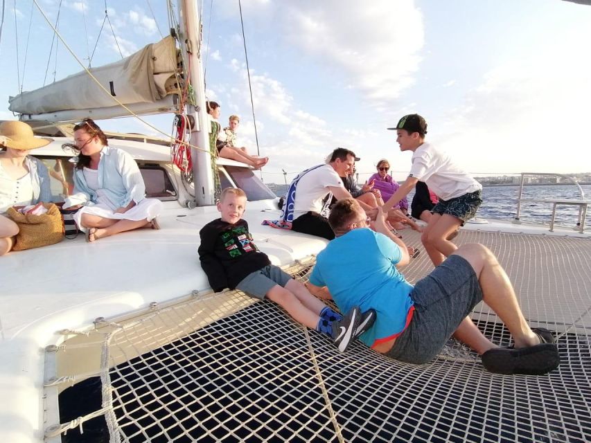 Rhodes: Sailing Catamaran Day Cruise with food and drinks - Booking advice, cancellation, and what to bring