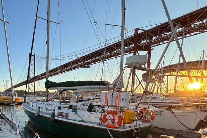 Romantic Sunset Sailing Experience in Lisbon - Cristo Rei across the water