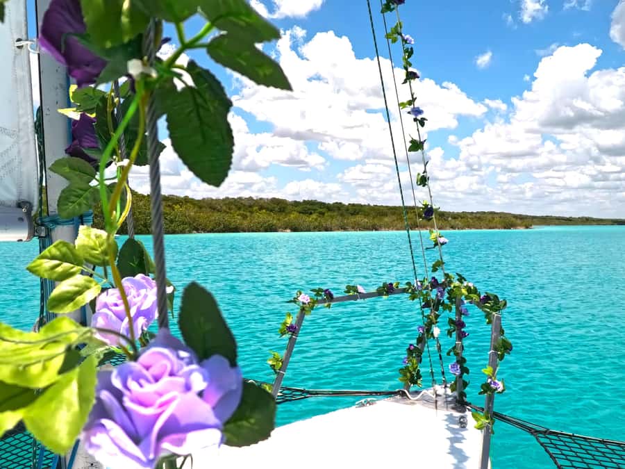 Sail for 4 hours in the most SECRET spot in Bacalar. INCLUDES Beach Club. - Setting out on the catamaran