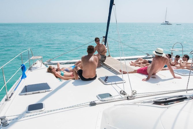 Sailing Catamaran Cruises - Benetier Island gives the day a shore break