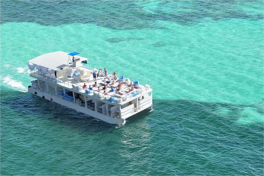Sailing Splash Tour Speedboat, Snorkel, and Catamaran - Snorkeling over Punta Cana’s colorful reef