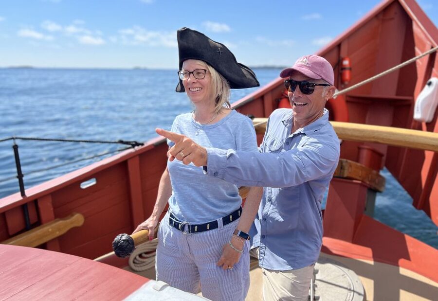 Salem: Historic Schooner Sailing Cruise - Helping with the sails and taking the tiller