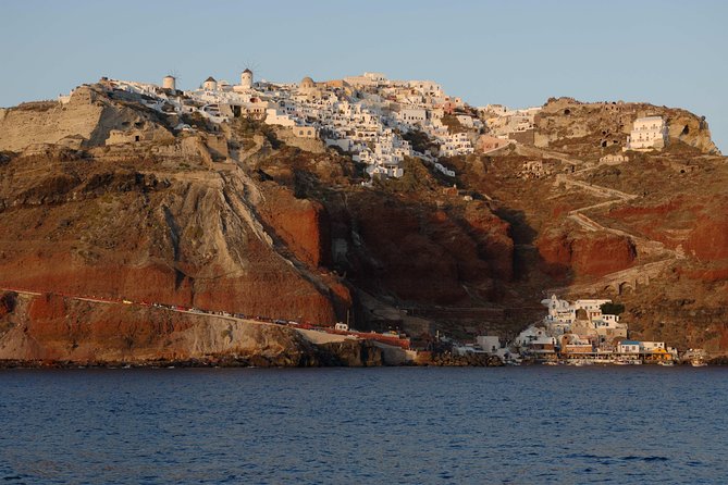 Santorini Caldera Sunset Sailing Cruise with Dinner and Wine - Pickup, comfort, and what to bring